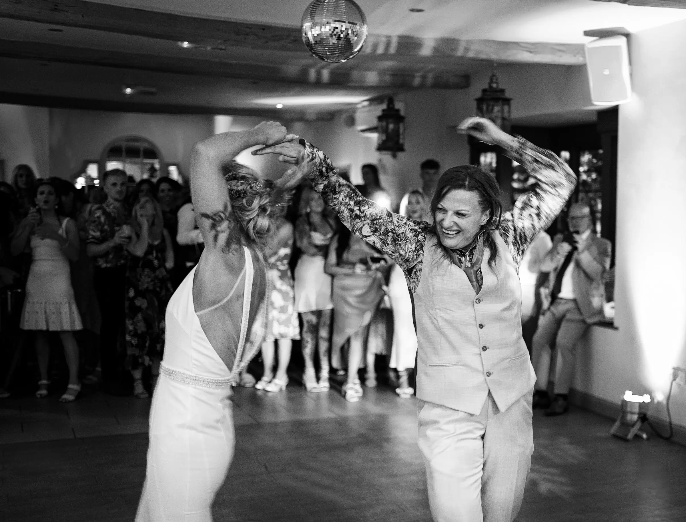 Amy and Abby's first dance at Doddington Hall with Amy spinning and Abby playing the matador, a spectacular and joyful moment captured by Gary Phillip, Lincolnshire