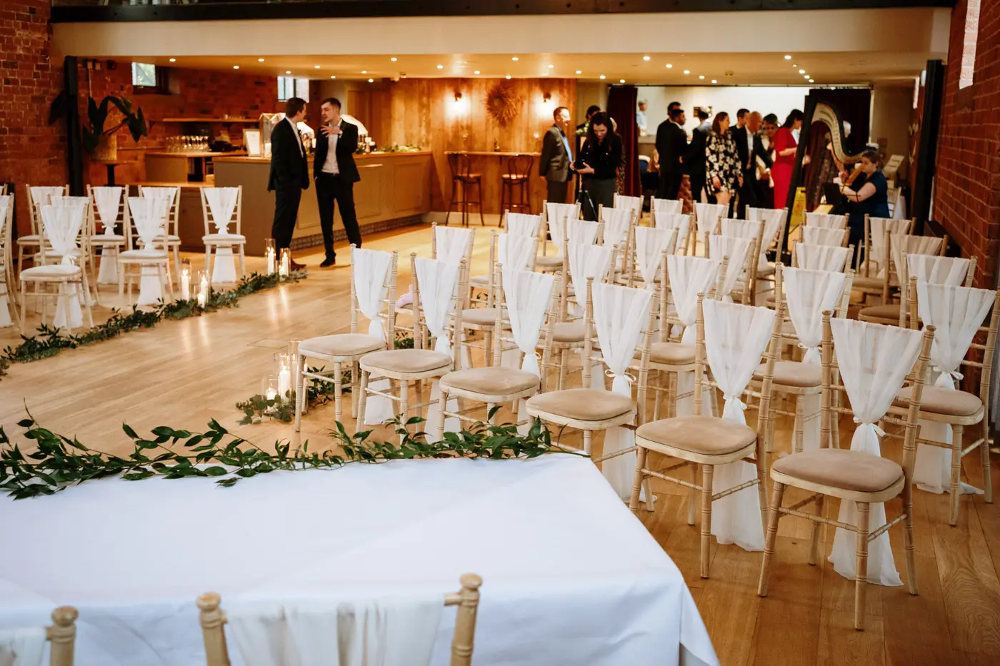 The beautifully laid out service room at Carriage Hall, Nottinghamshire set up and ready for Ellen and Ben's February wedding ceremony