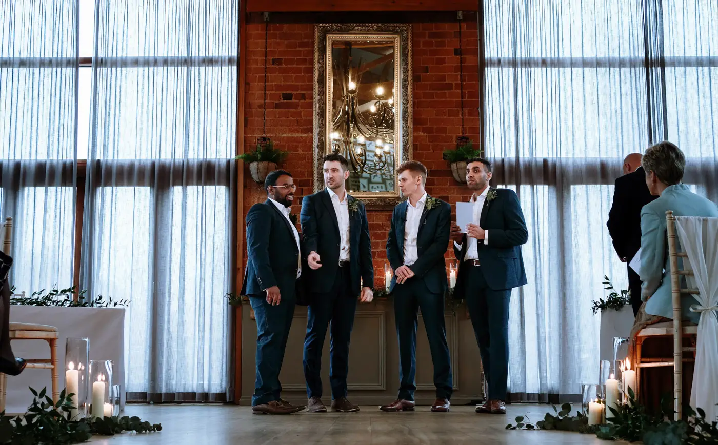 Three groomsmen waiting and supporting groom Ben ahead of his wedding ceremony at Carriage Hall, Nottinghamshire