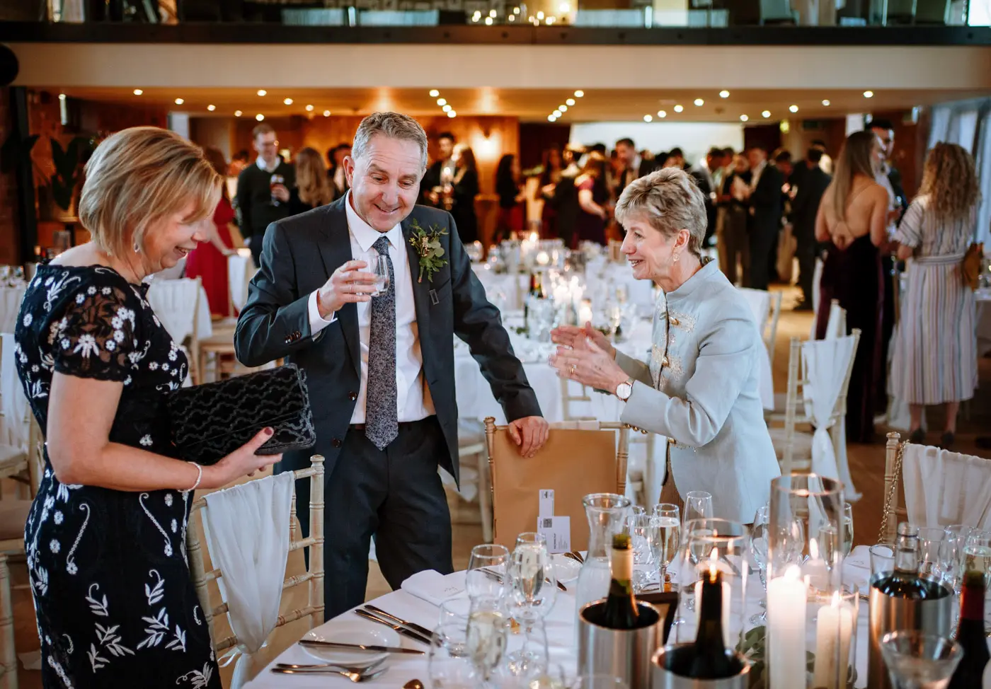 Mother of the groom seated at the top table with the mother and father of the bride at Carriage Hall, Nottinghamshire