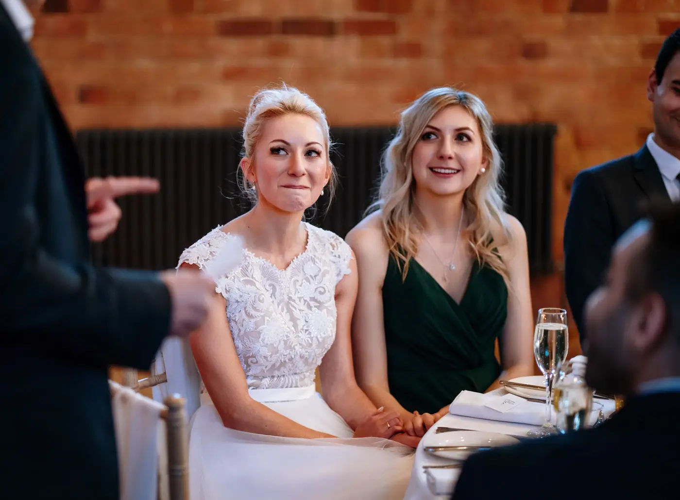Bride Ellen fighting back the tears with deep emotion during groom Ben's wedding speech at Carriage Hall, Nottinghamshire