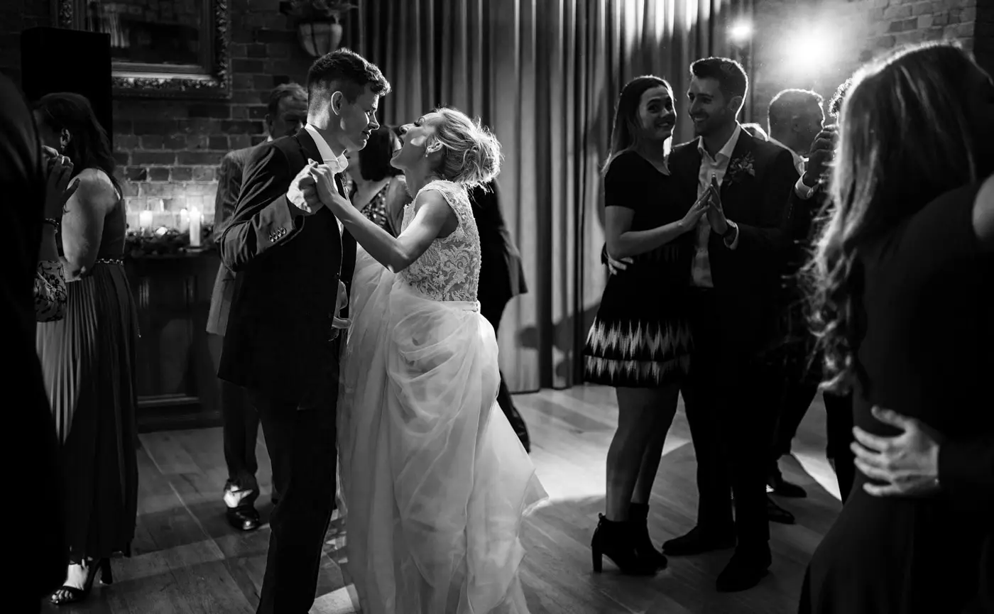 Ellen and Ben dancing amongst their guests on the dancefloor at Carriage Hall, Nottinghamshire