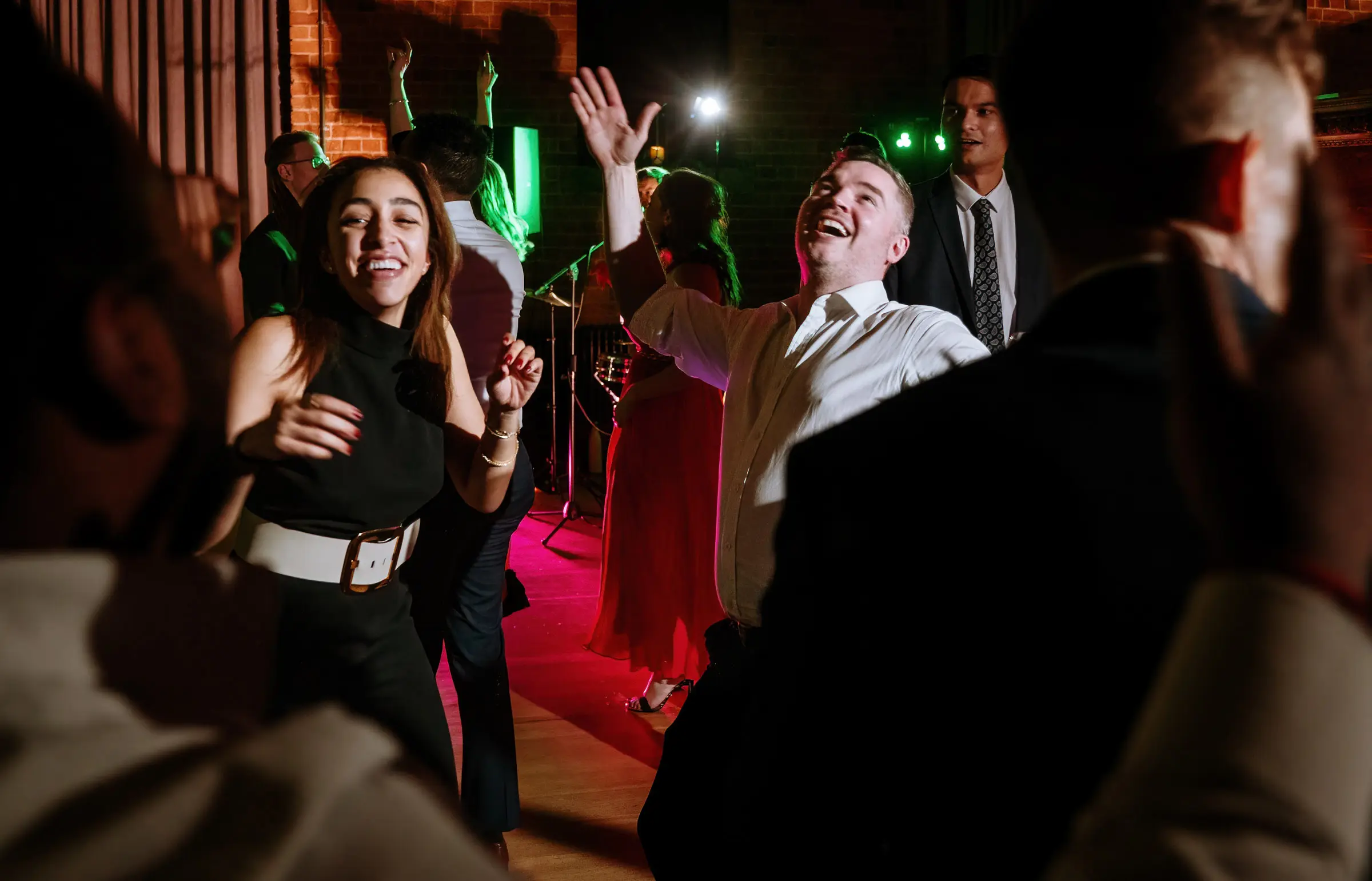 Wedding guests really going for it on the dancefloor at Carriage Hall on Ellen and Ben's February wedding night in Nottinghamshire