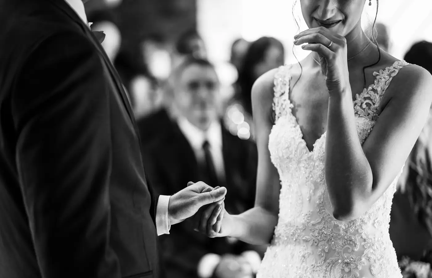 Bride Krissie becoming emotional the moment the ring is on her finger at Swancar Farm, Nottinghamshire, a deeply moving ceremony photograph by Gary Phillip