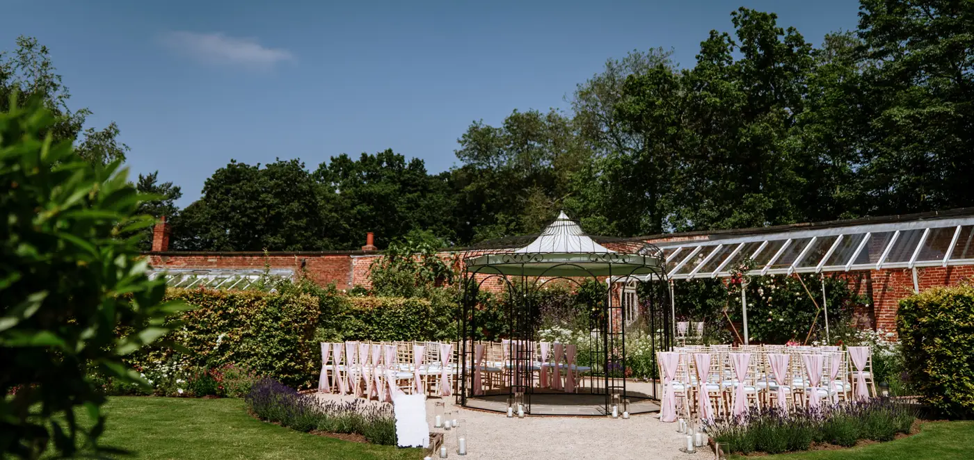 The outdoor venue setup at The Walled Garden at Beeston Fields, Nottingham, beautifully prepared for Laura and Gavin's summer wedding