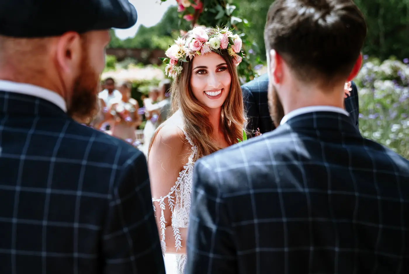 Bride Laura seeing groom Gavin for the first time with a massive smile on her face at The Walled Garden at Beeston Fields, Nottingham