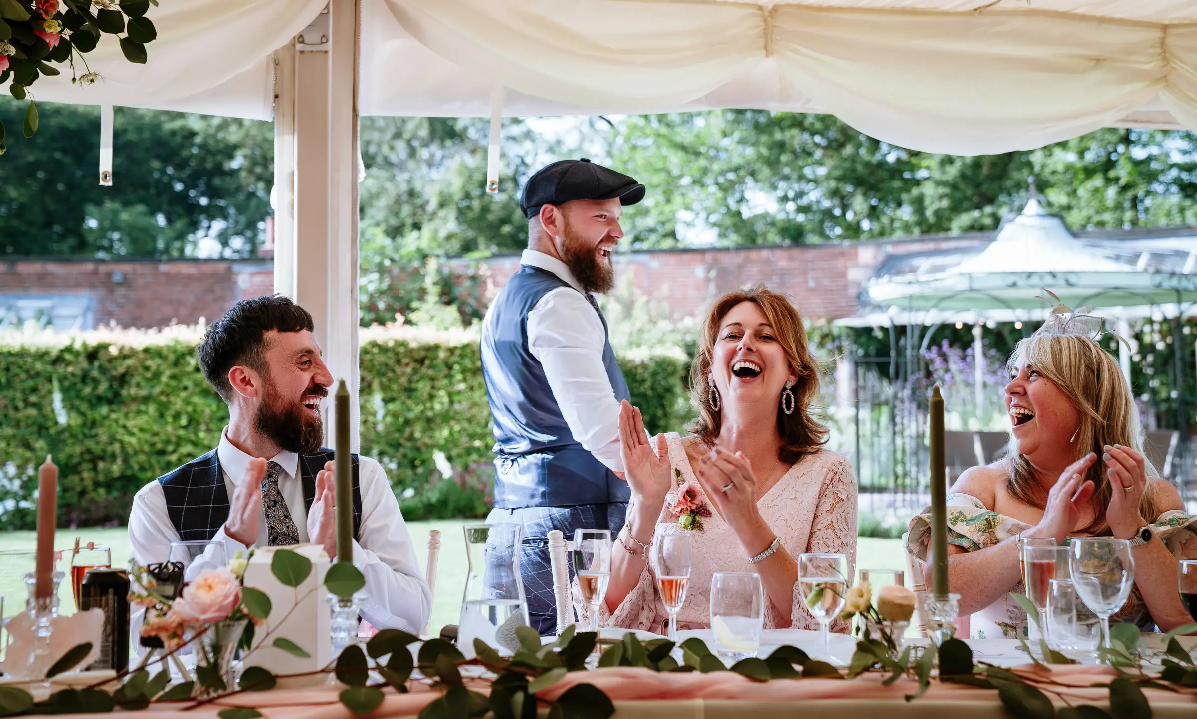 Best man walks to the mic at The Walled Garden at Beeston Fields, delivers one line, drops the mic and sits back down while the whole room erupts in laughter