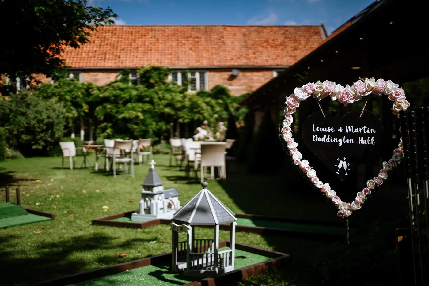 The coach house garden at Doddington Hall beautifully set up and ready for Louise and Martin's wedding reception in Lincolnshire
