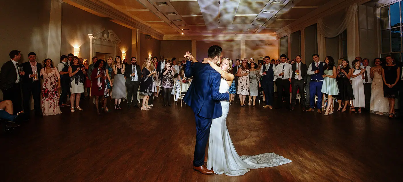 Bride Sally and groom Luke sharing their first dance in colour at Stubton Hall, Nottinghamshire, wedding evening photography by Gary Phillip