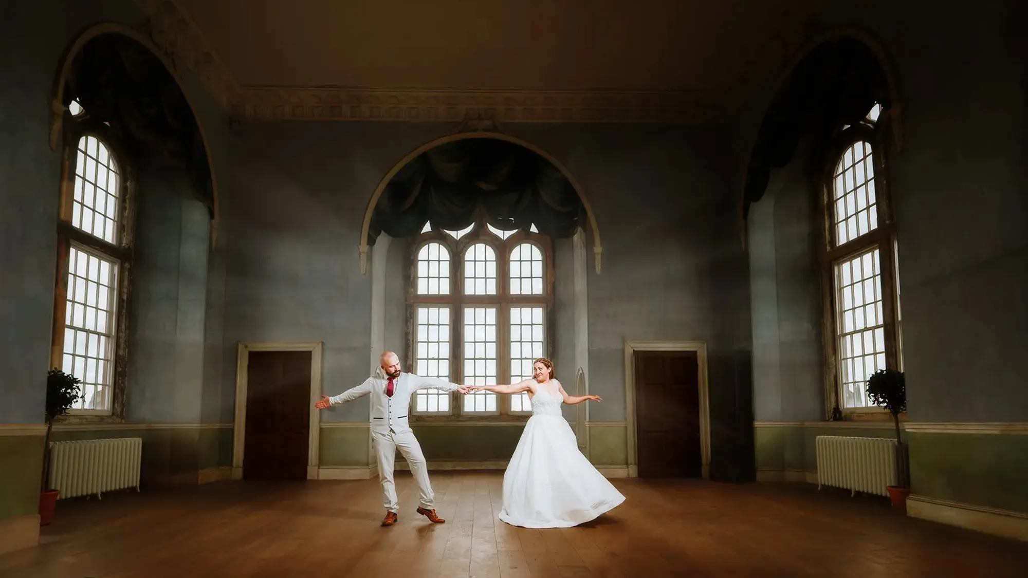 Amy and Andy dancing in the stateroom at Wollaton Hall, Nottingham, documentary wedding photography by Gary Phillip